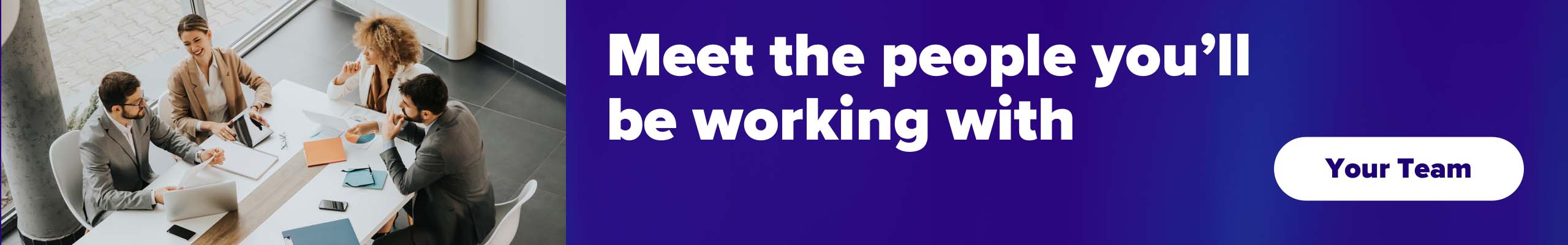 A group of people working in an office setting